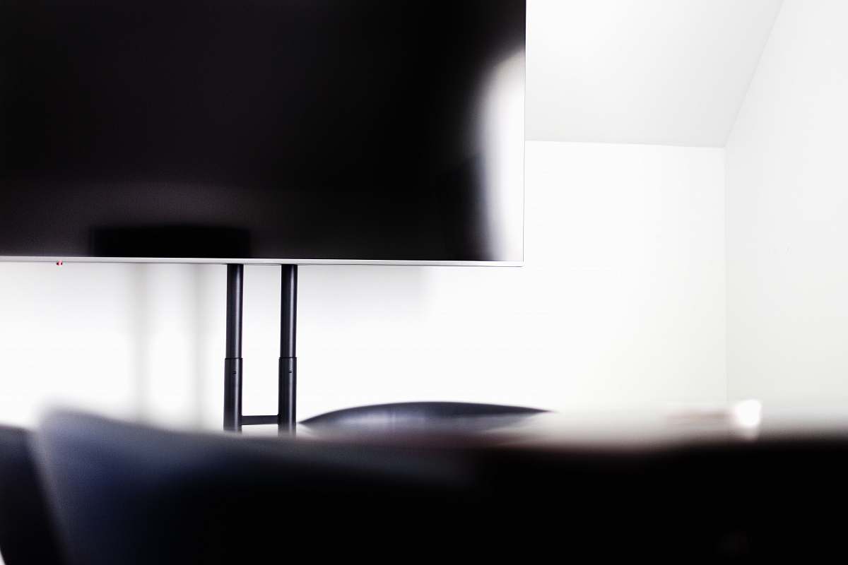 conference room silver flat screen TV showing black screen room